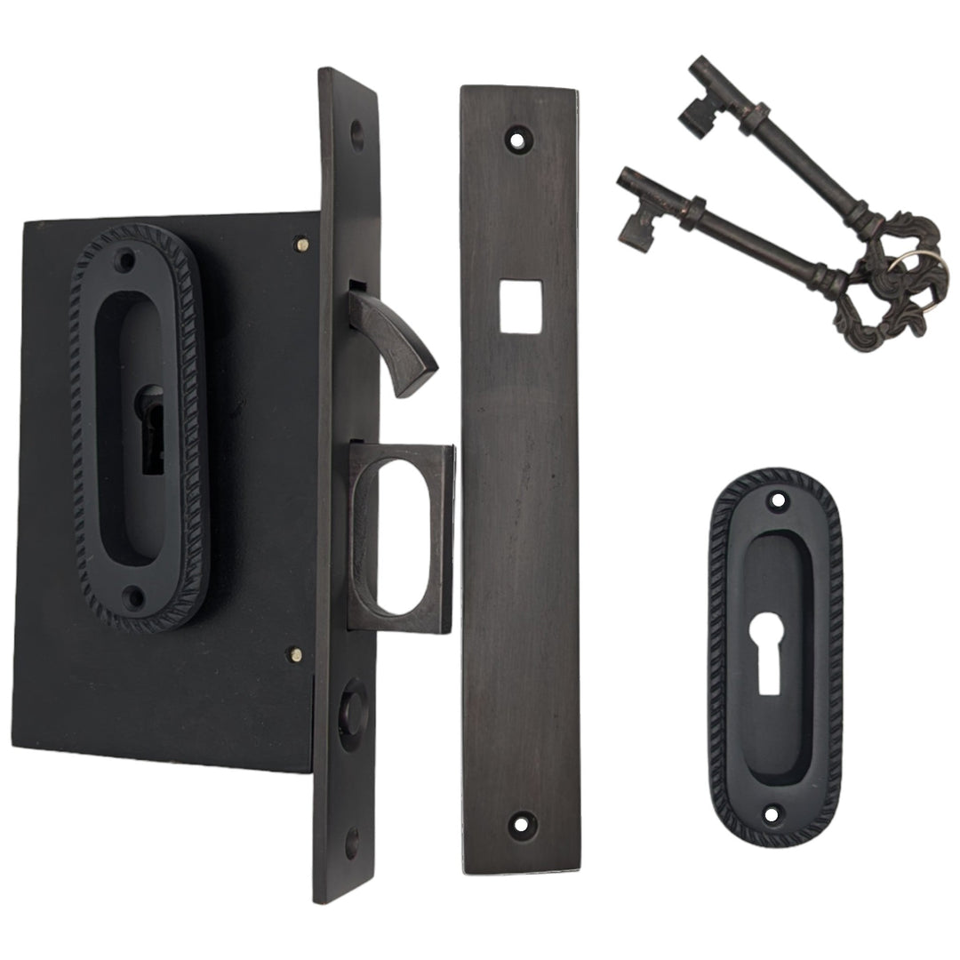 Georgian Oval Pattern Pocket Privacy (Lock) Style Door Set COPPER MOUNTAIN HARDWARE